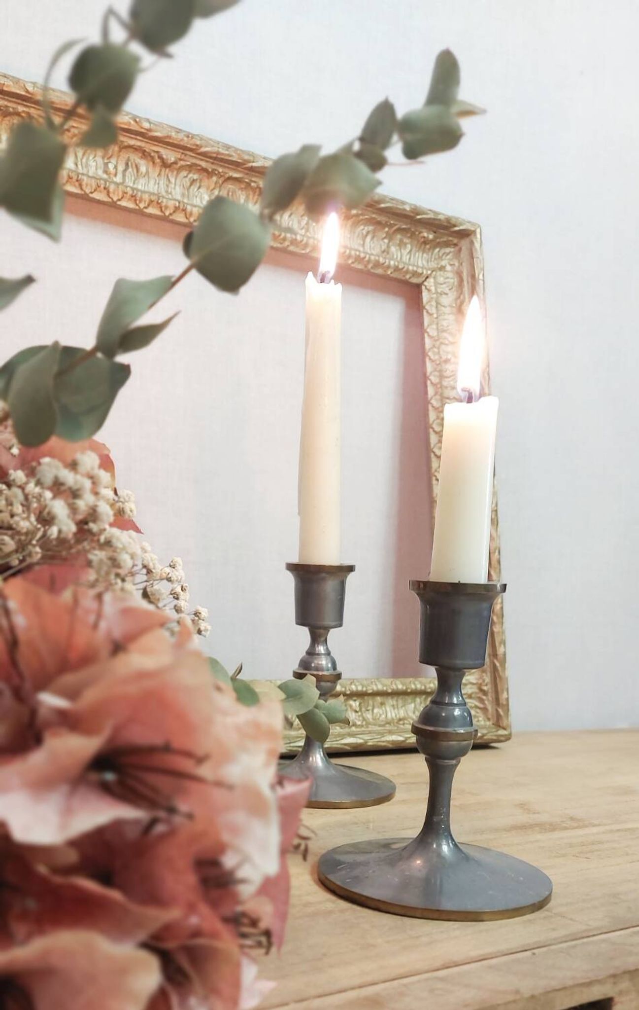 Pair of pewter candle holders