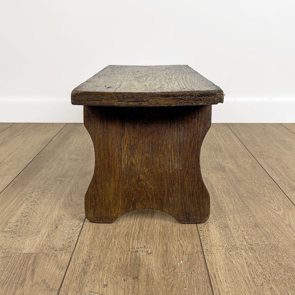 Small bench or old footrest