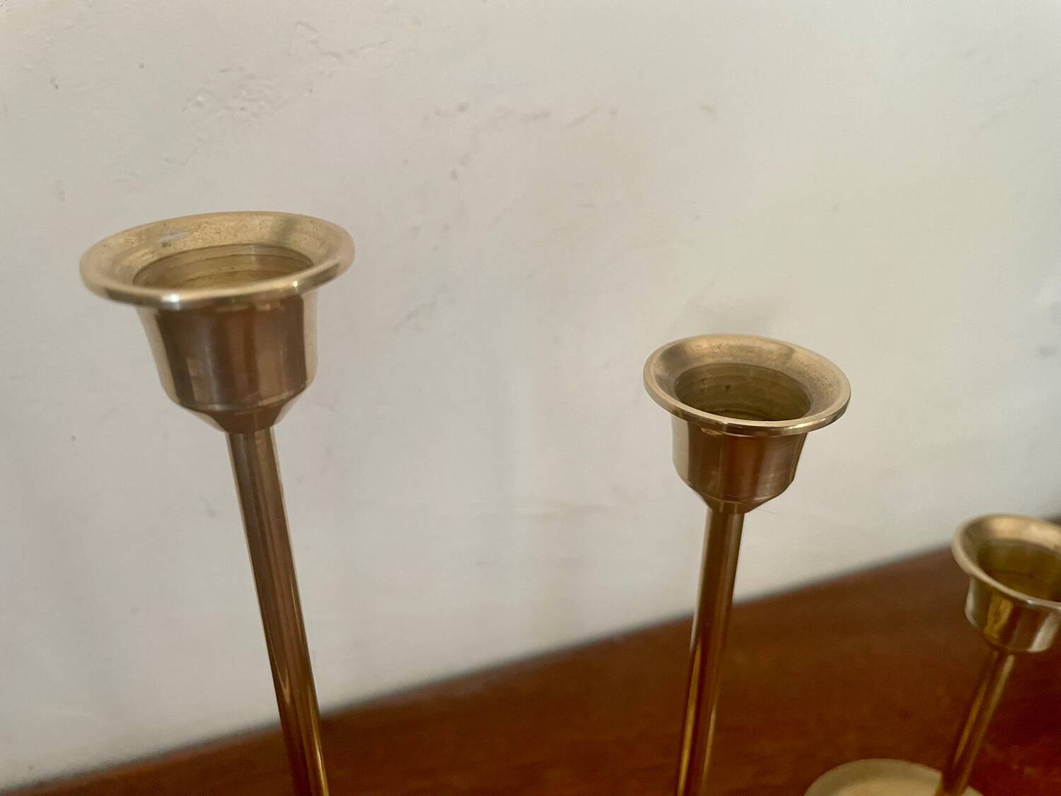 Set of 4 Scandinavian brass candlesticks