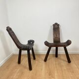 Pair of low tripod chairs in solid wood, mid-20th century.