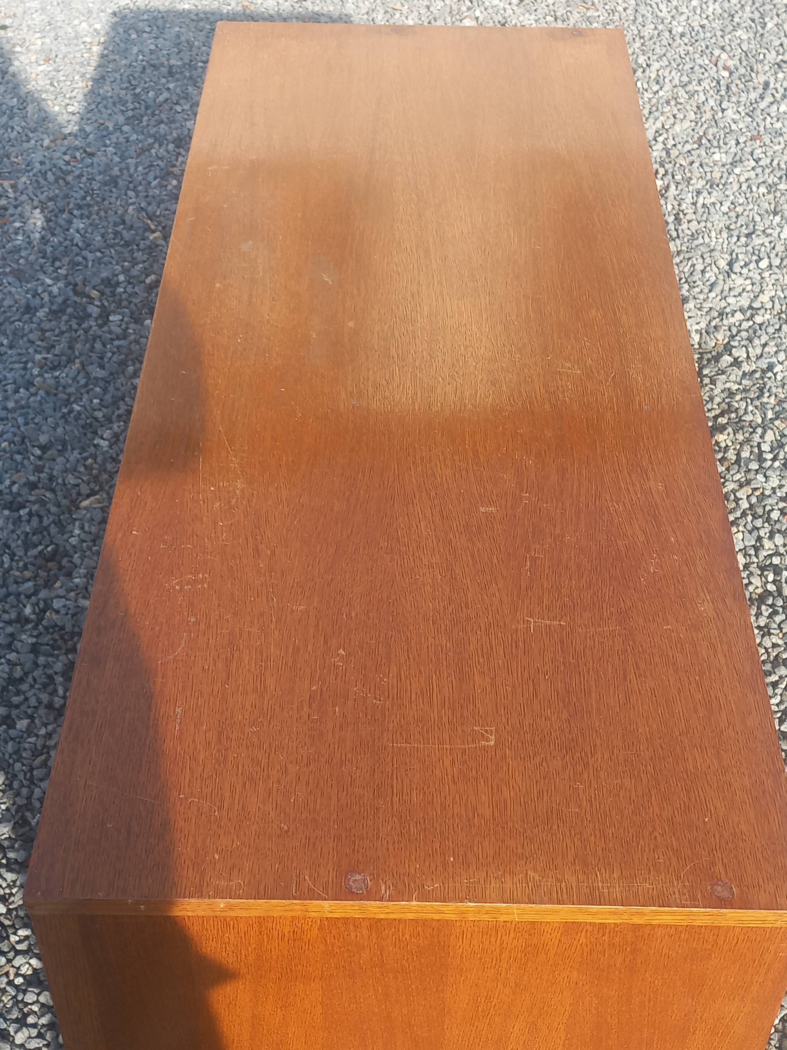 Vintage oak sideboard with splayed legs from the 1950s.