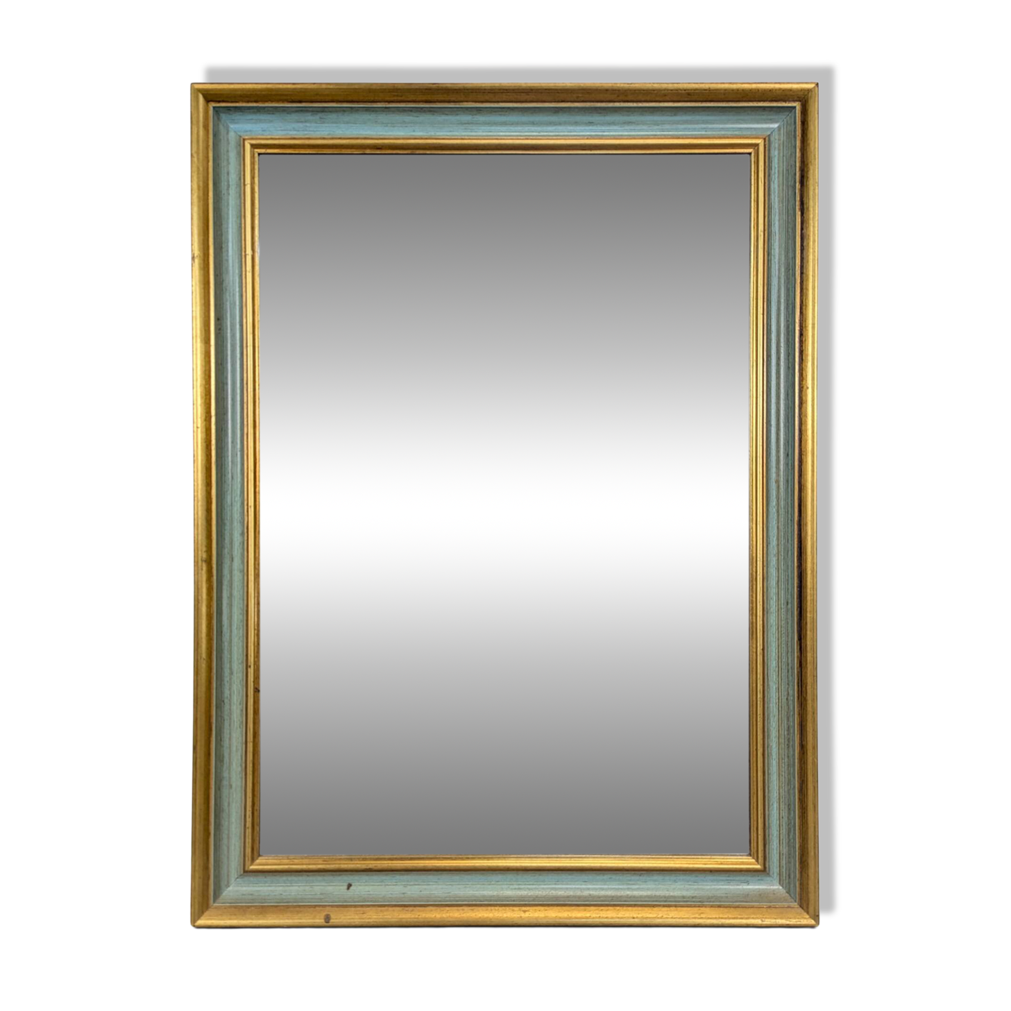 Rectangular mirror with a green and gold lacquered frame.