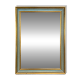 Rectangular mirror with a green and gold lacquered frame.