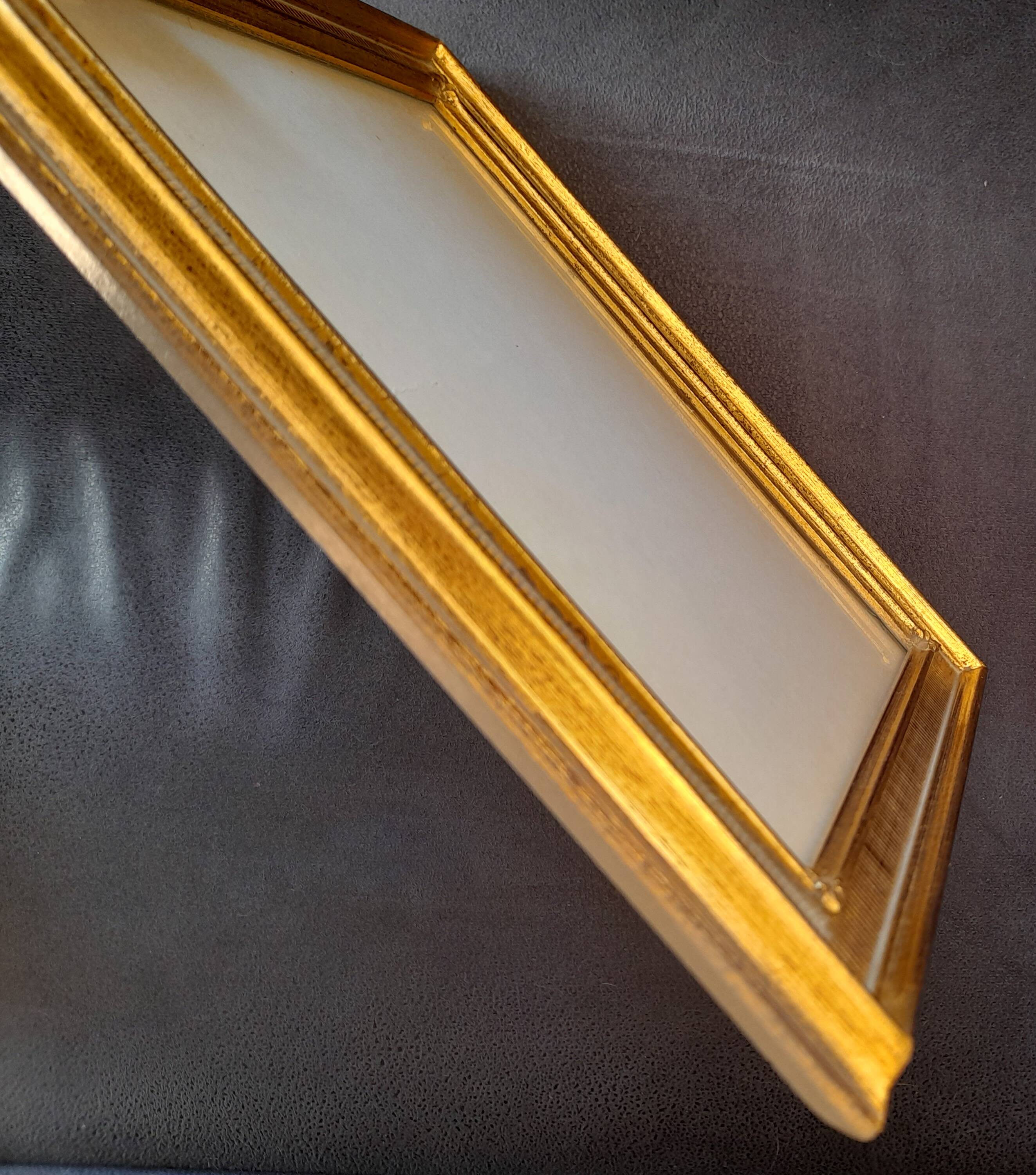 Antique frame with striated gilding