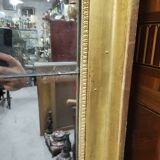 Large gilt mirror in 2 parts from the early 19th century
