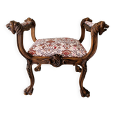 Neo-Renaissance banquette style with lion heads