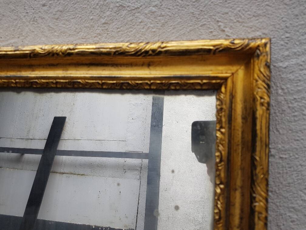 Carved wooden mirror gilded from the louis xv period