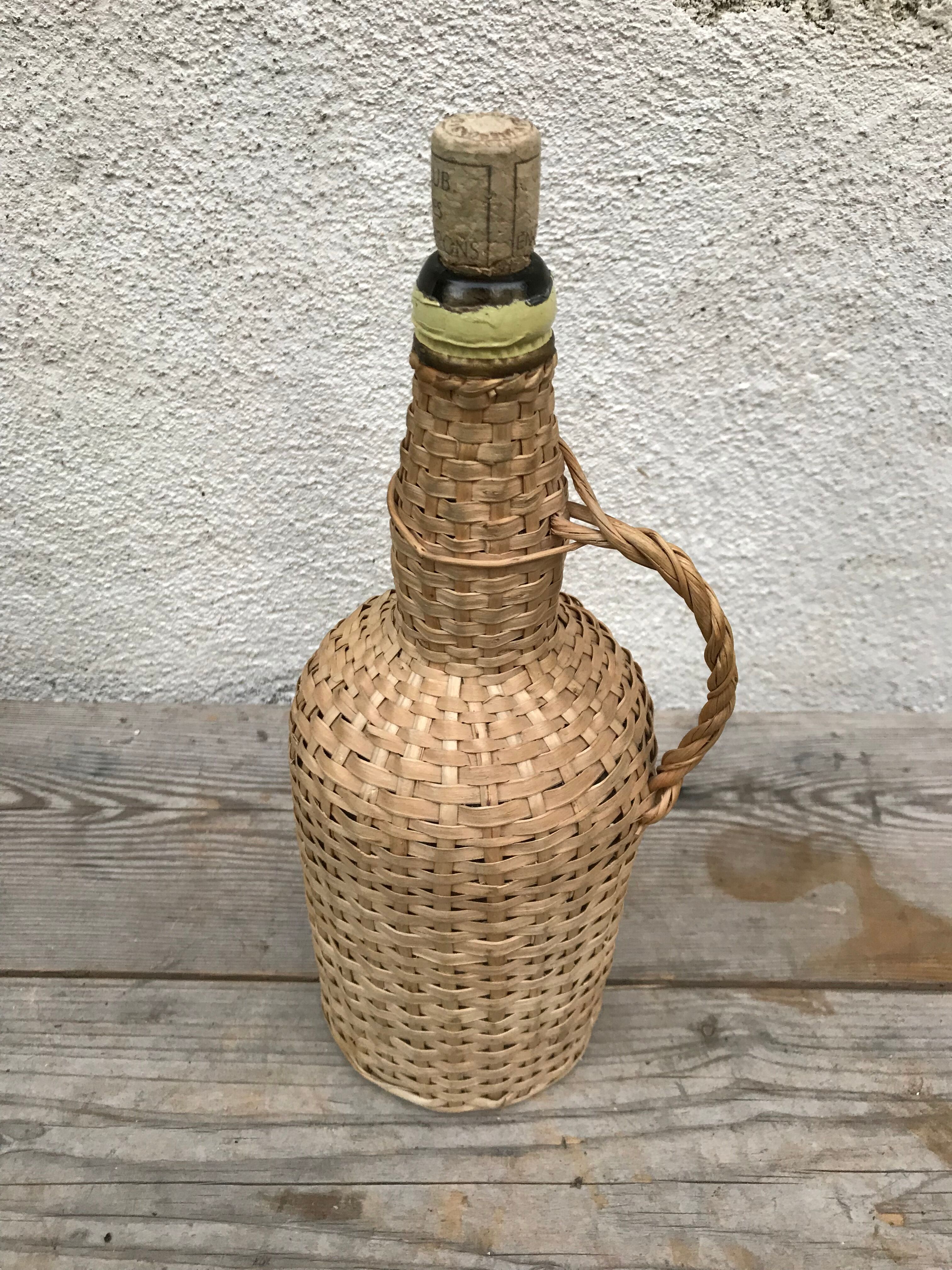 Bottle old woven wicker rattan