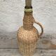 Bottle old woven wicker rattan