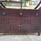 Round galay shelf on bahut sideboard