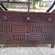 Round galay shelf on bahut sideboard