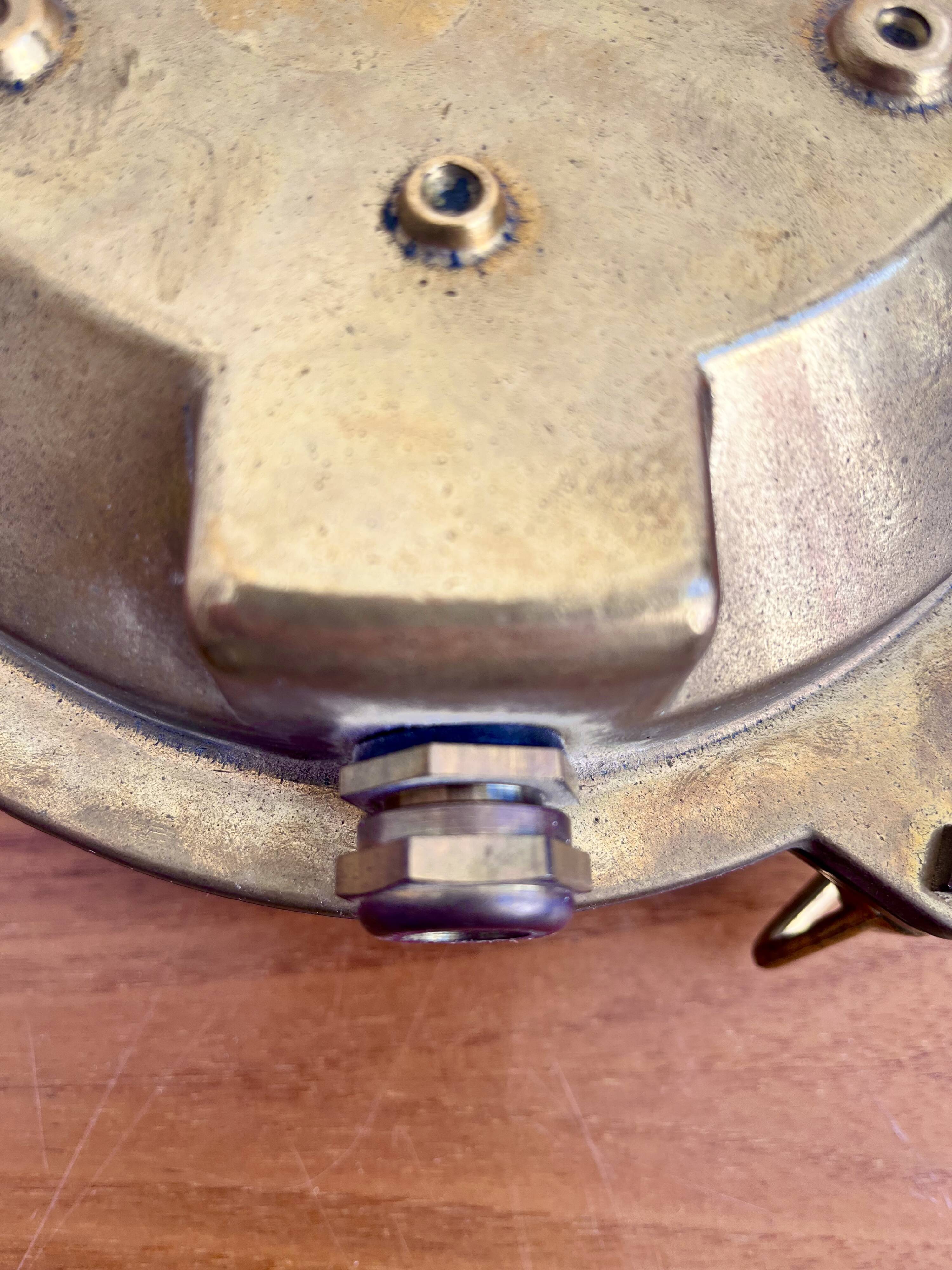 Marine decorative wall light in solid brass