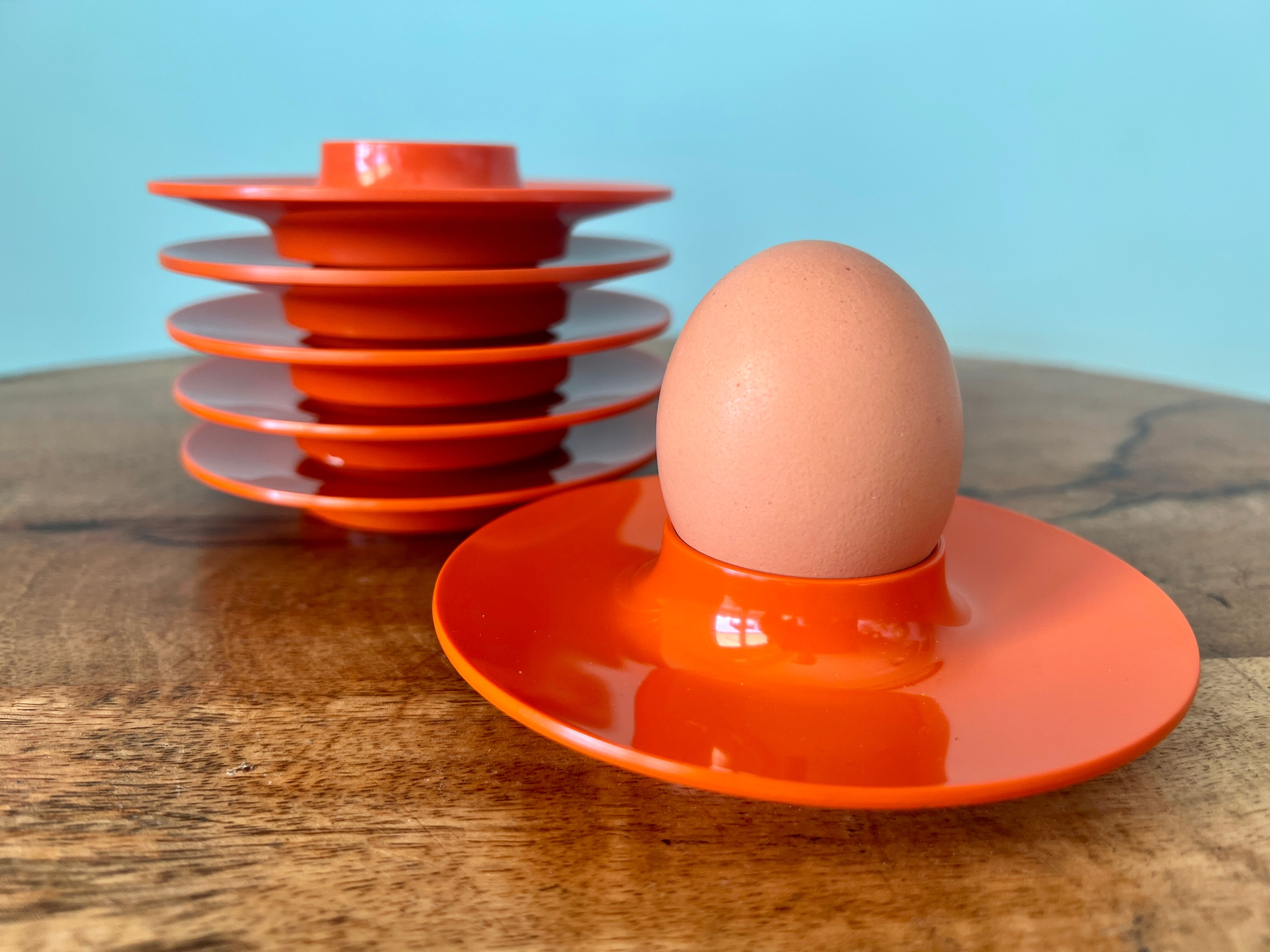 Rosti Mepal set of 6 orange egg cups, space age from Scandinavian design for apartment decoration