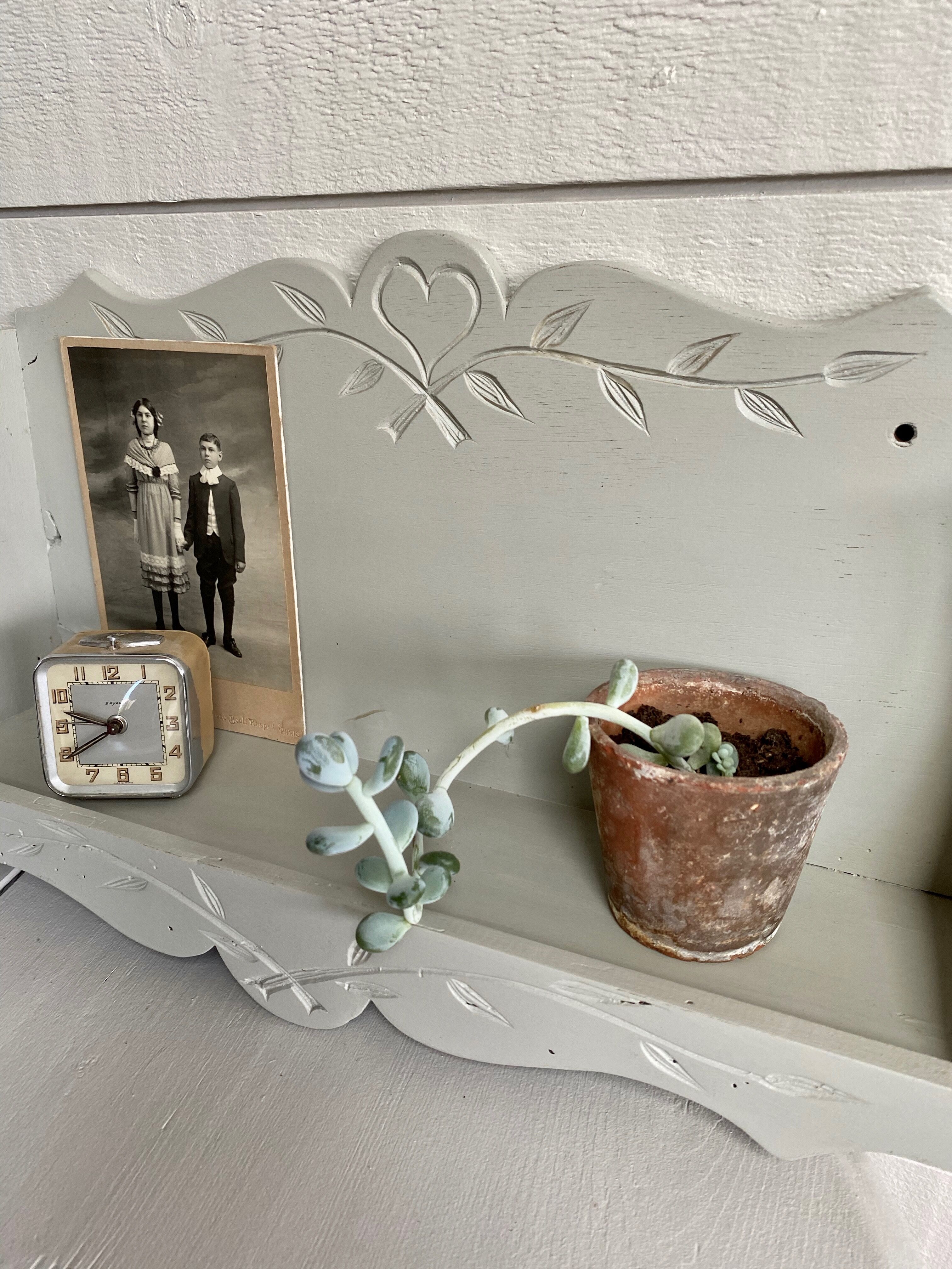 Scalloped wooden shelf