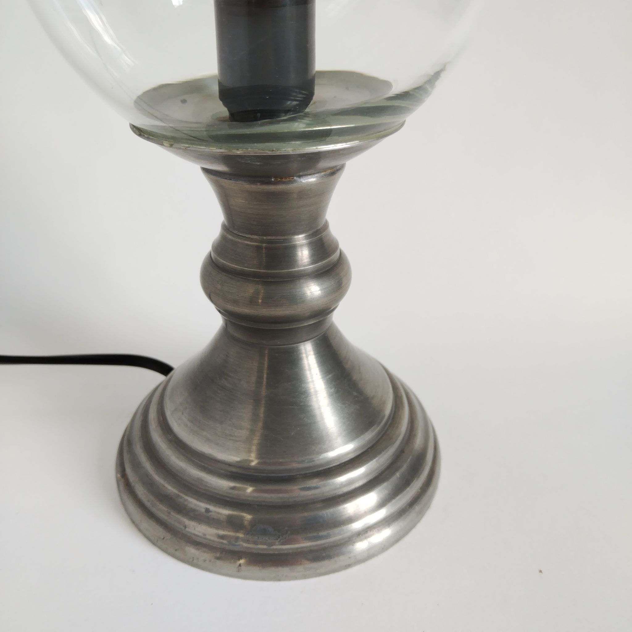 Vintage lamp consisting of a glass tulip-shaped fireplace and a pewter foot