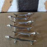 Series of 6 door metal knife dog