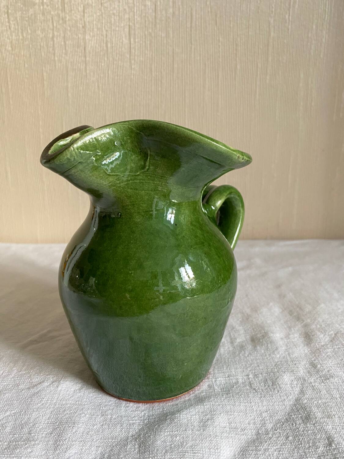 Provençal pitcher in green glazed earthenware