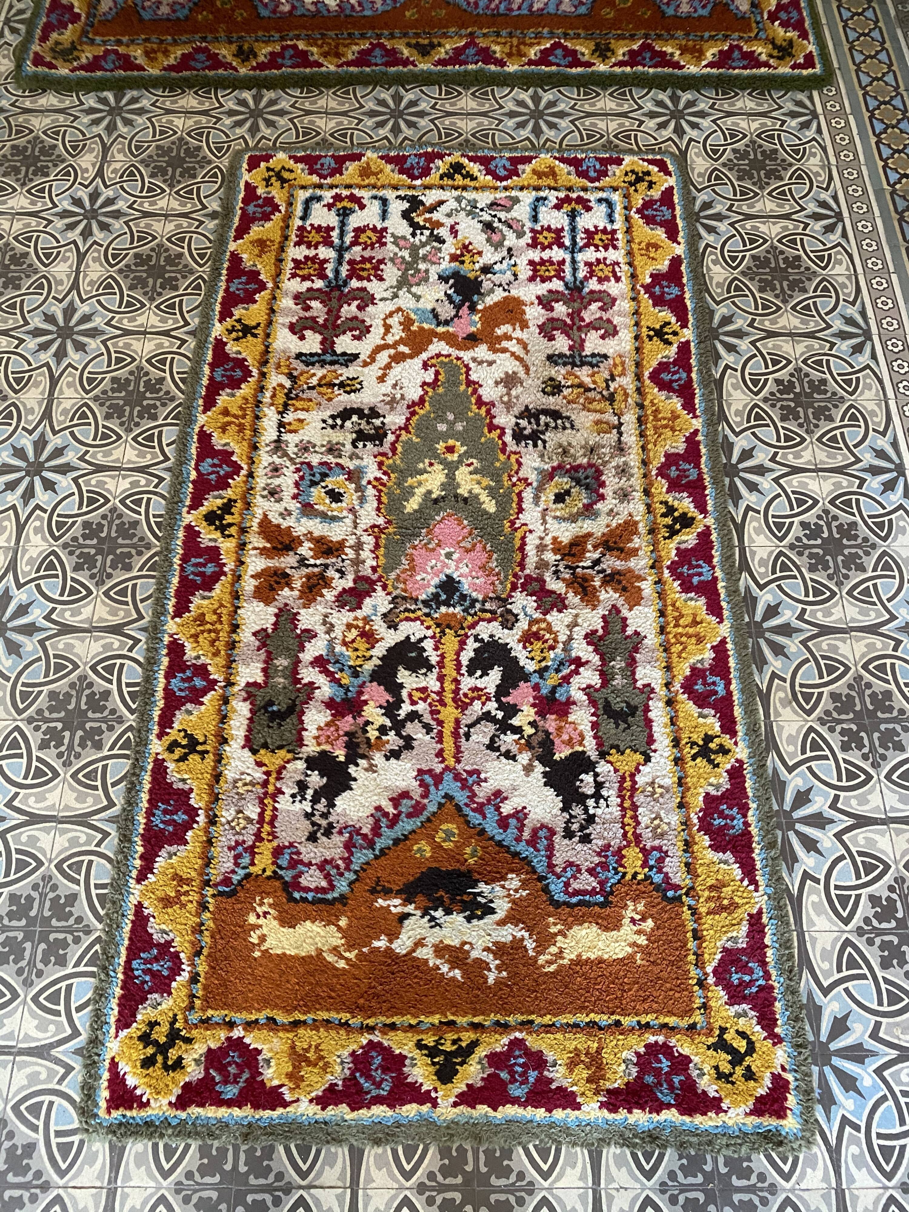 Duo of old oriental wool rugs