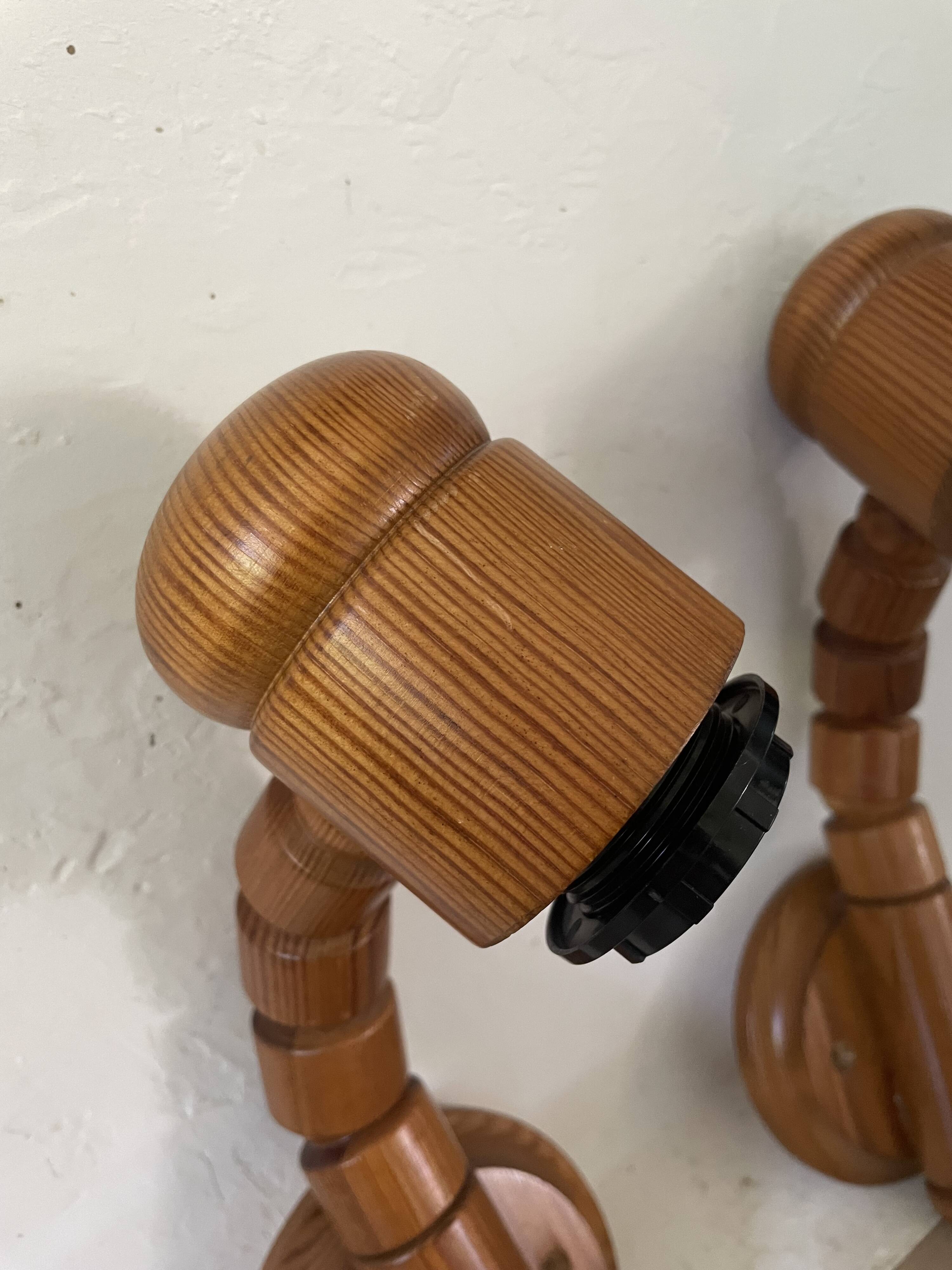 Pair of articulated Scandinavian wall lights SOLBACKEN in vintage wood