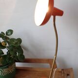 Vintage adjustable lamp, orange, made of metal.
