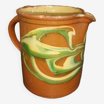 Terracotta milk jug