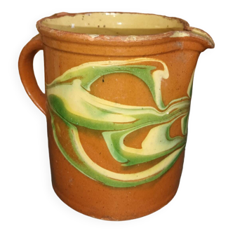 Terracotta milk jug