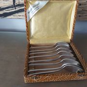 Coffret de 8 cuillères art déco en métal argenté