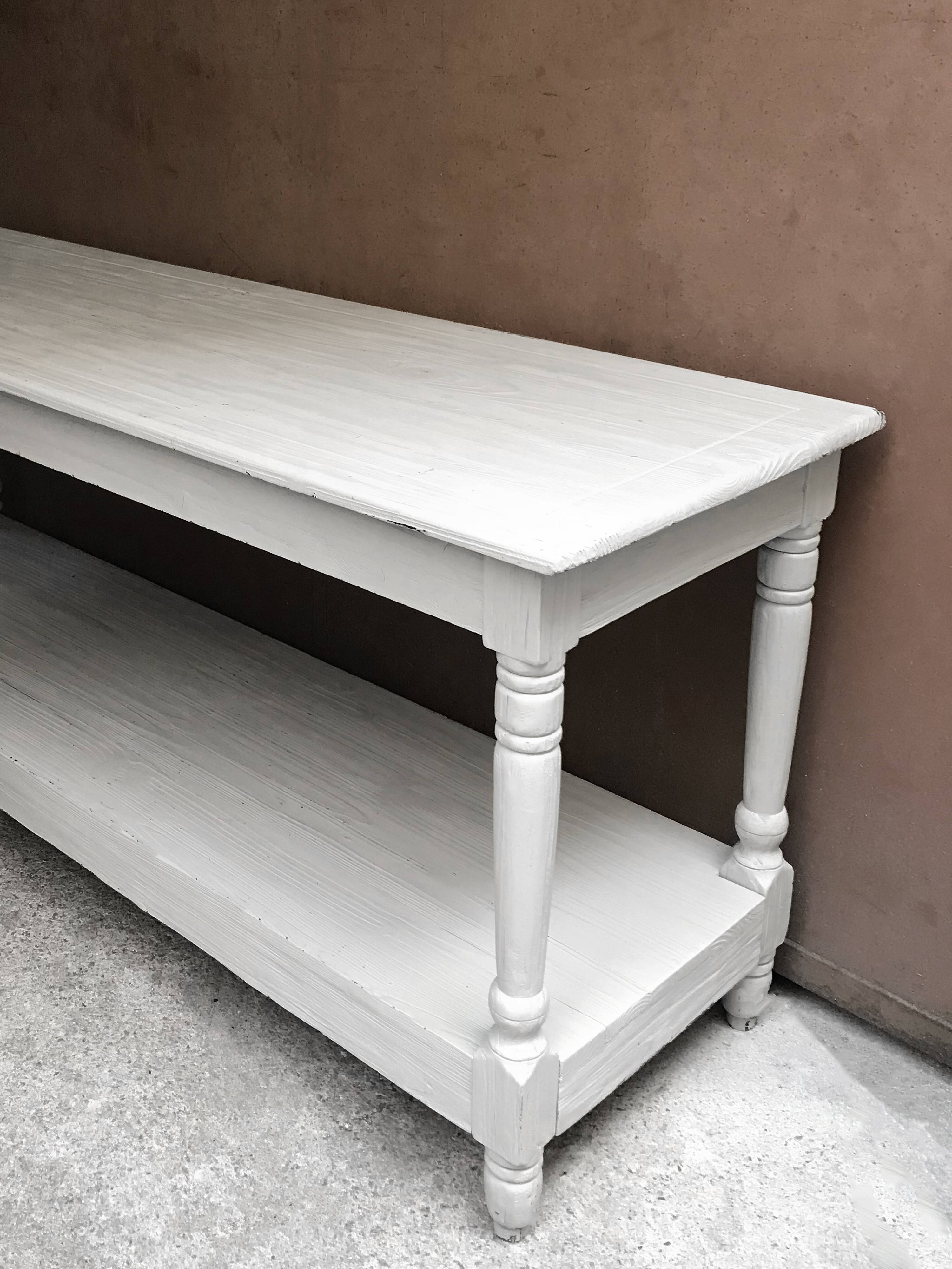 Table of drapier of light grey white color of 1.72 meters