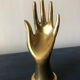 Brass hand