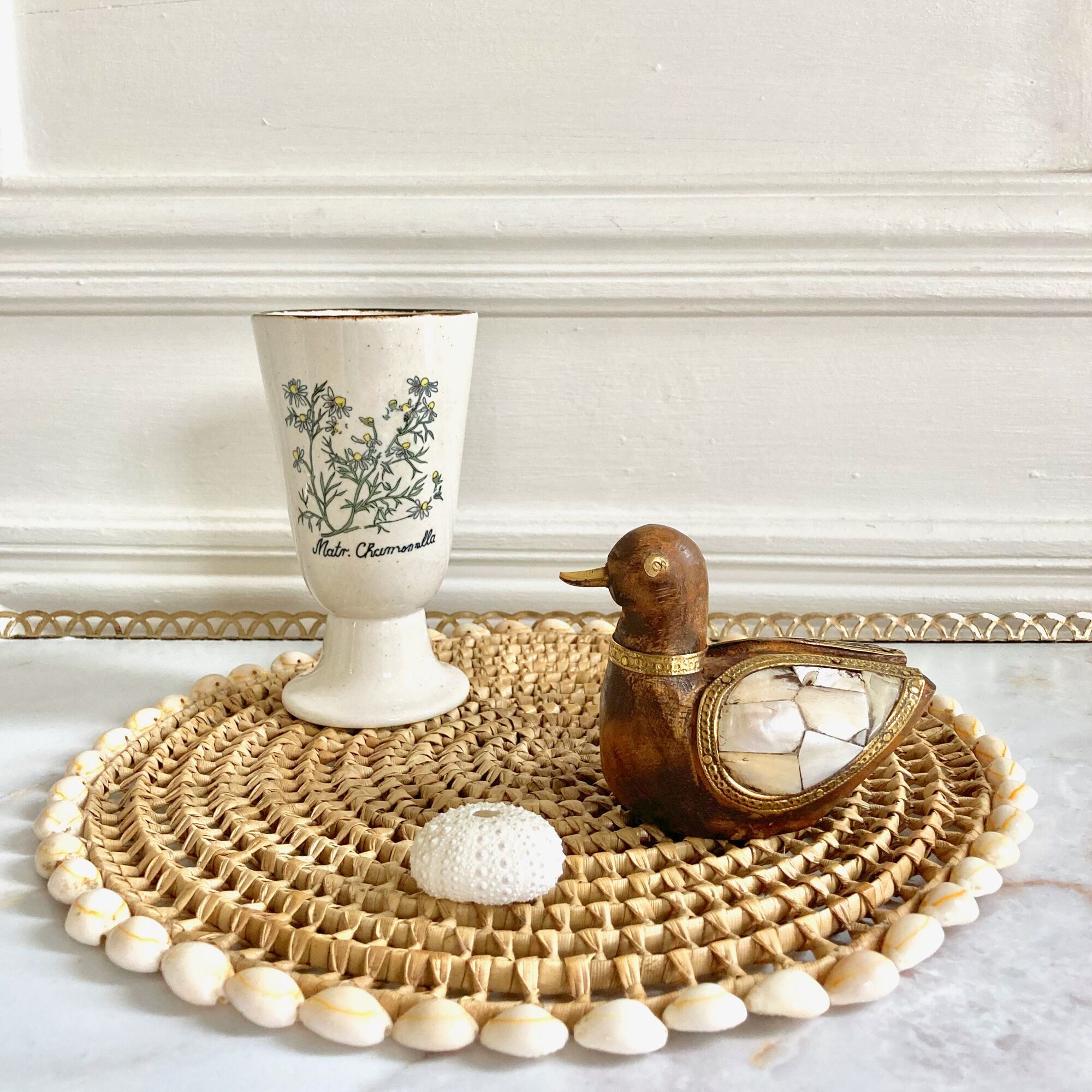 Wood brass duck and mother-of-pearl