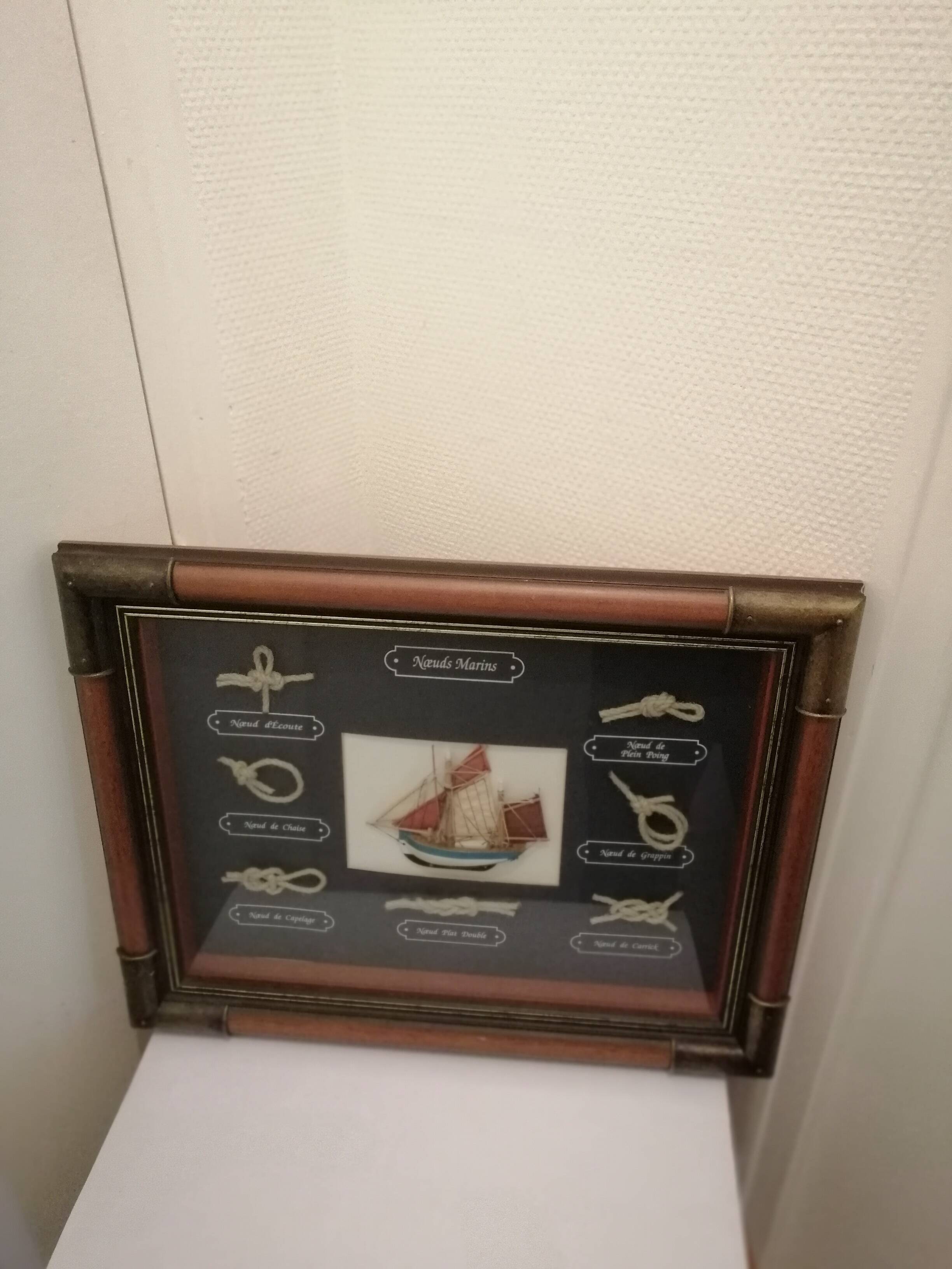 Frame marine knots in wood and brass