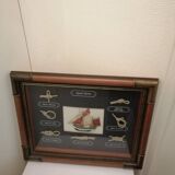 Frame marine knots in wood and brass