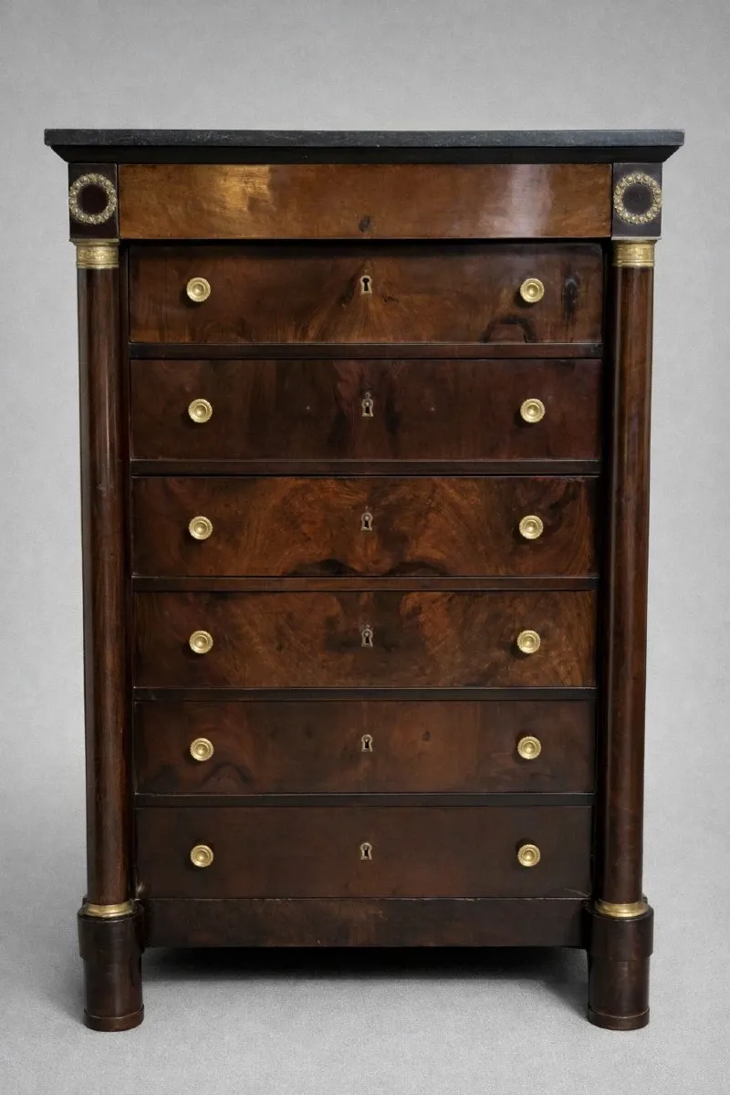 Empire period chest of drawers, early 19th century, in flame mahogany.