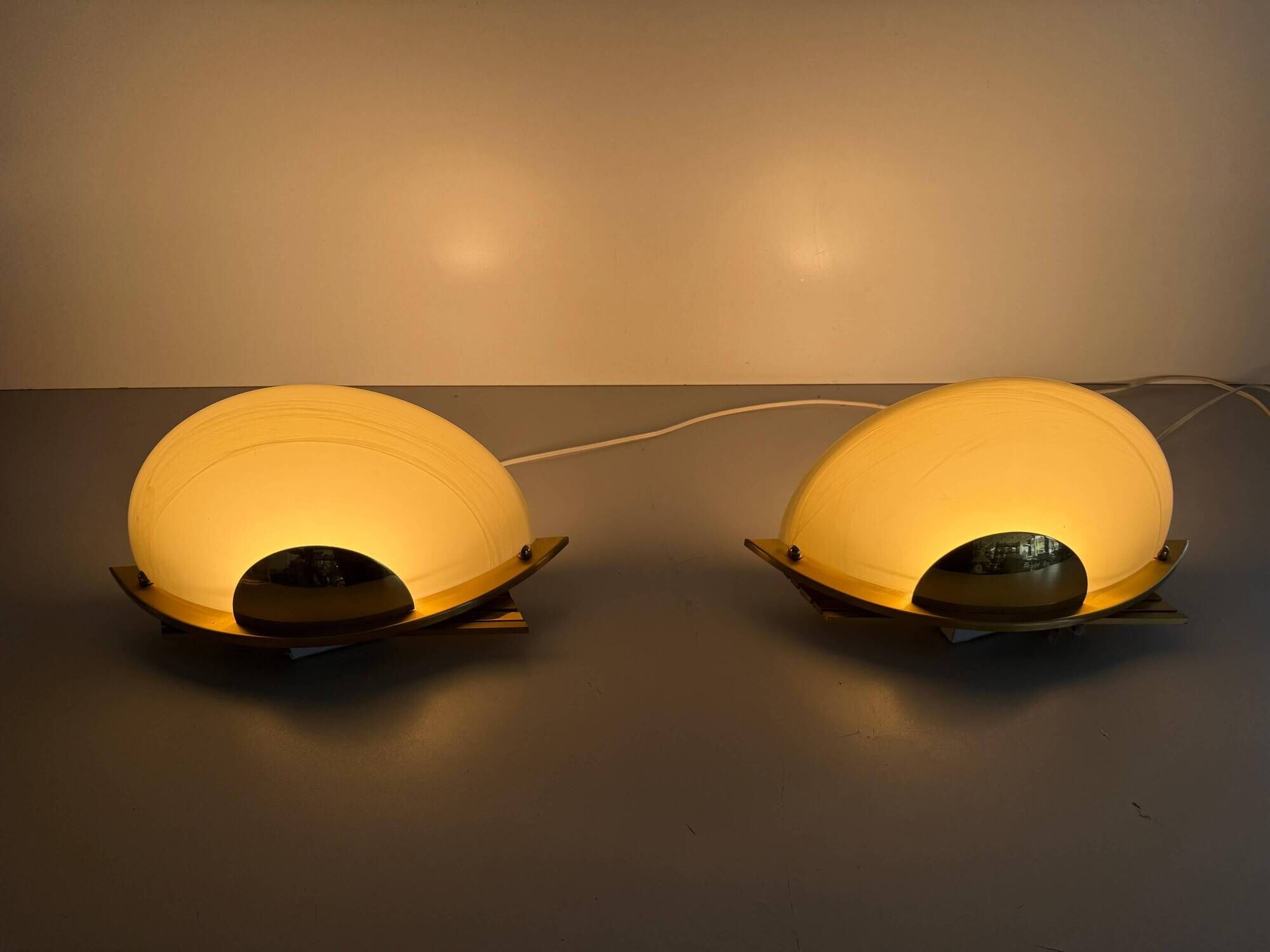 Pair of brass and glass wall lights from the Spage era, 1980, Germany.