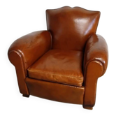 Club chair with a moustache backrest