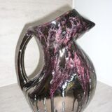 Pitcher in the shape of a stylized bird