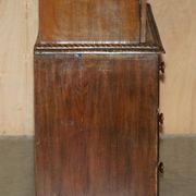 19th-century Anglo-Indian colonial hardwood library on a chest of drawers.
