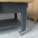 Coffee table on casters made from a vintage table, 1 drawer, 1 slate gray shelf.