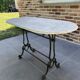 Bistro table in cast iron and marble from the art nouveau period.