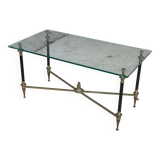 Regency style glass coffee table with crossed legs