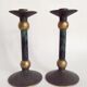 Pair of patinated bronze candlesticks