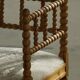 Antique French corner chair handcrafted with lamb's wool, early 20th century.