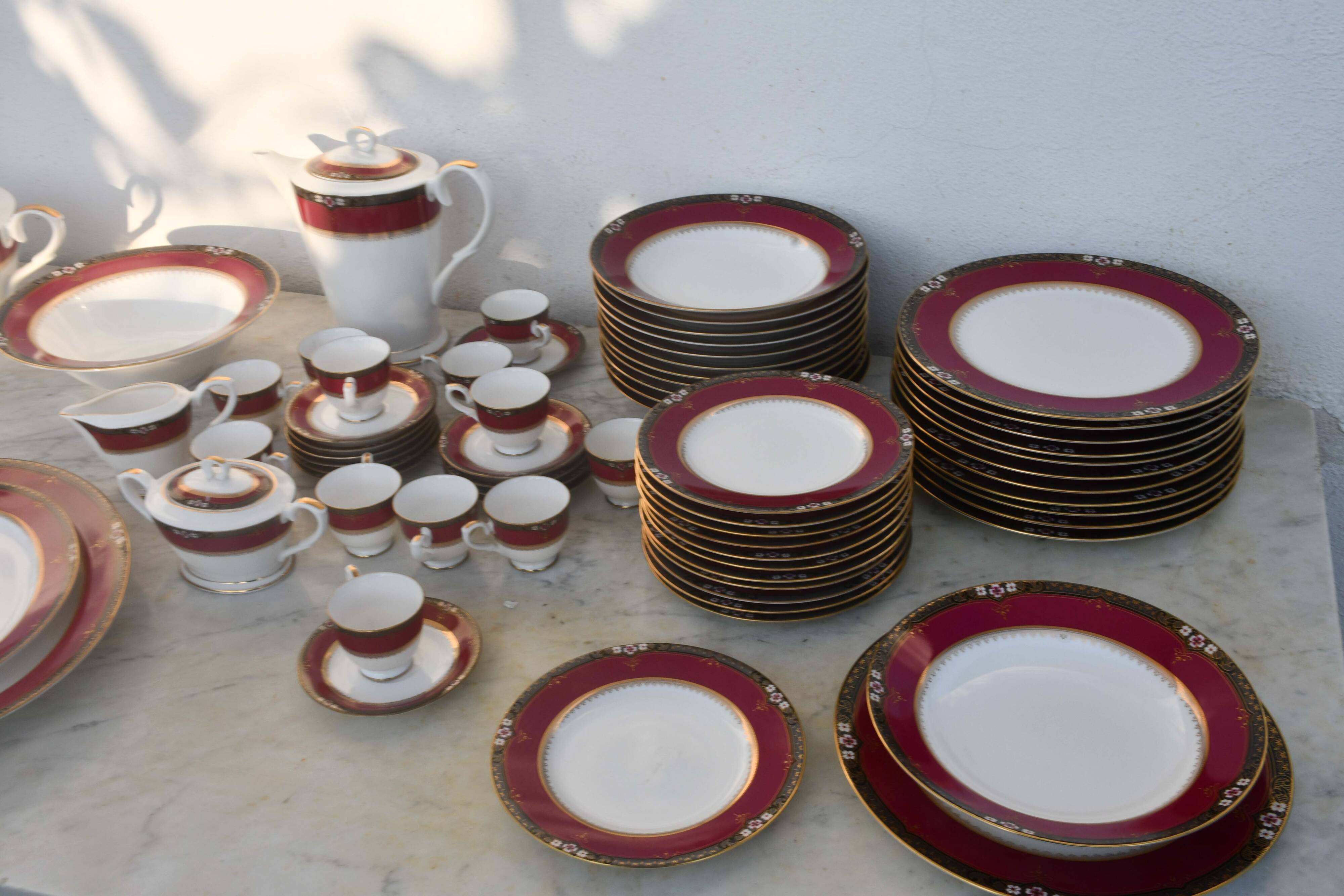 Elegant mid-century Japanese bone china service for 12 in white and noble red