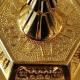 Menorah/Jewish/Hebrew candlestick with 7 arms of light. Engraved with the symbols of the 12 tribes of Israel/Holyland inscription. In gold metal. Size 20 x 16 cm