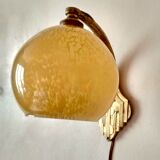 Art deco sconce, golden brass and yellow speckled Clichy glass globe