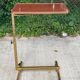 Foldable and adjustable serving trolley in wood and gold-plated steel