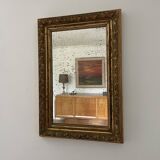 Antique mirror in gilded wood