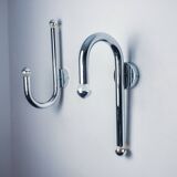 Pair of space-age tubular wall lights, chromed metal, Italy, 1970