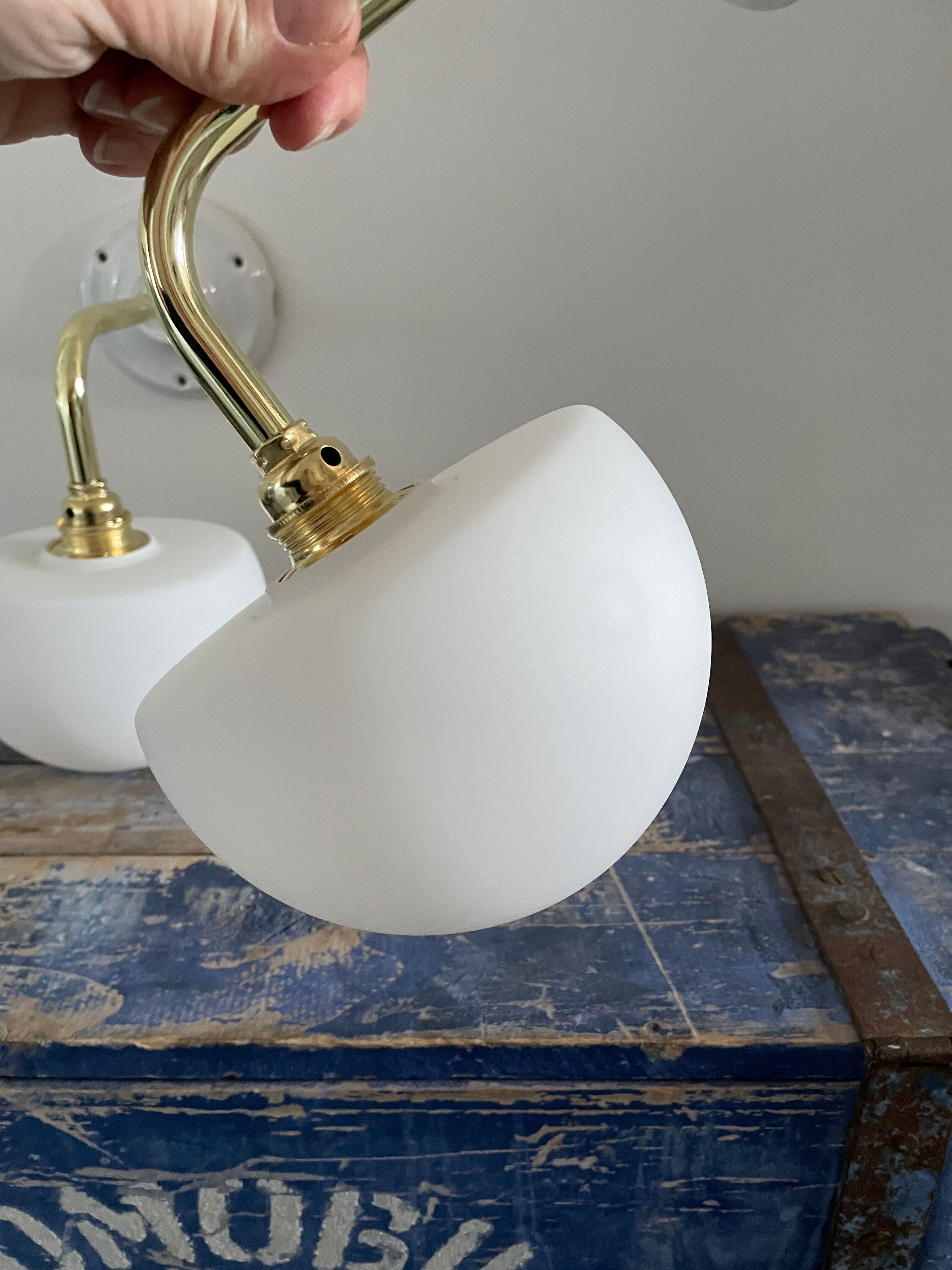 Set of two electrified white opaline wall lamps to nine