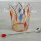 Glass ice bucket, metal spoon and vintage bakelite